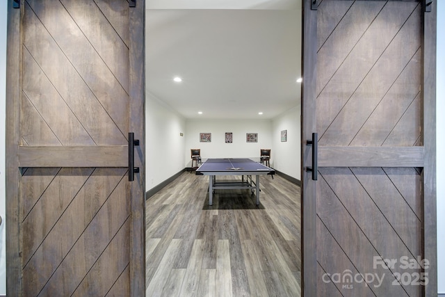 141 Forsythia Ln, Tega Cay, SC 29708 - playroom with baseboards, recessed lighting, a barn door, and wood finished floors