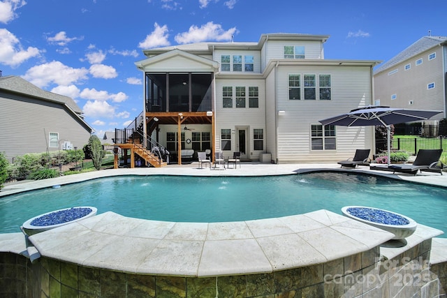 141 Forsythia Ln, Tega Cay, SC 29708 - rear view of house with a patio, an outdoor pool, stairs, a sunroom, and fence