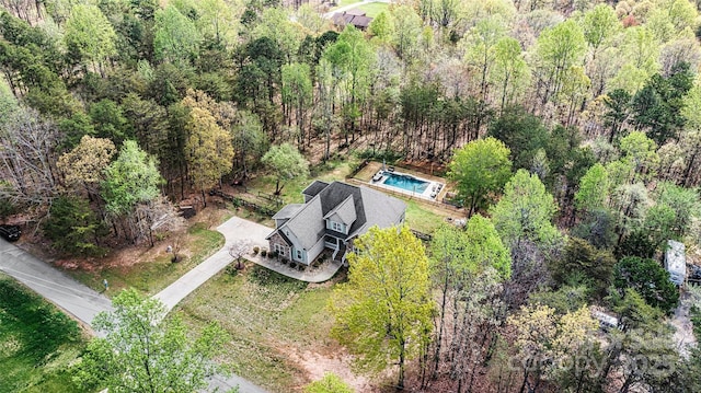 bird's eye view with a forest view