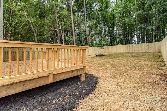 2512 Remington St, Charlotte, NC 28216 - fenced backyard with a deck and view of scattered trees
