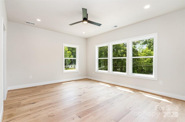 2512 Remington St, Charlotte, NC 28216 - unfurnished room featuring baseboards, ceiling fan, light wood finished floors, and recessed lighting