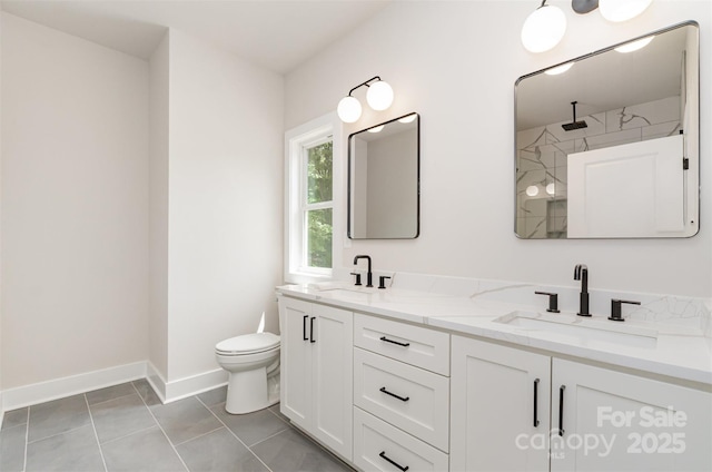 2512 Remington St, Charlotte, NC 28216 - full bath with double vanity, toilet, baseboards, and a shower