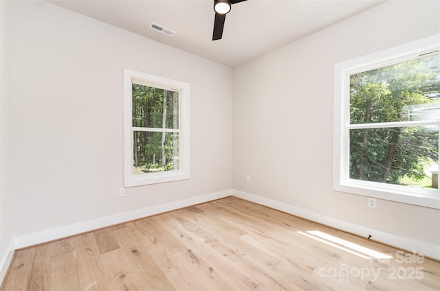 2512 Remington St, Charlotte, NC 28216 - unfurnished room featuring wood finished floors, baseboards, and ceiling fan