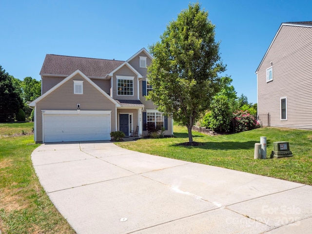 5102 Candleglow Ct, Indian Trail, NC 28079 - traditional-style home with driveway, a front yard, and a garage