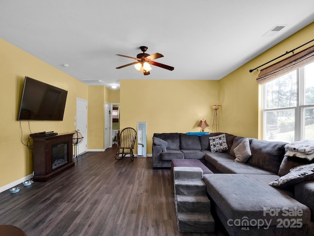 5102 Candleglow Ct, Indian Trail, NC 28079 - living area with baseboards, ceiling fan, visible vents, and dark wood-type flooring