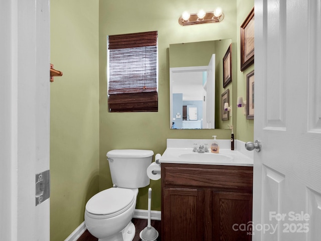 5102 Candleglow Ct, Indian Trail, NC 28079 - bathroom featuring toilet, baseboards, and vanity