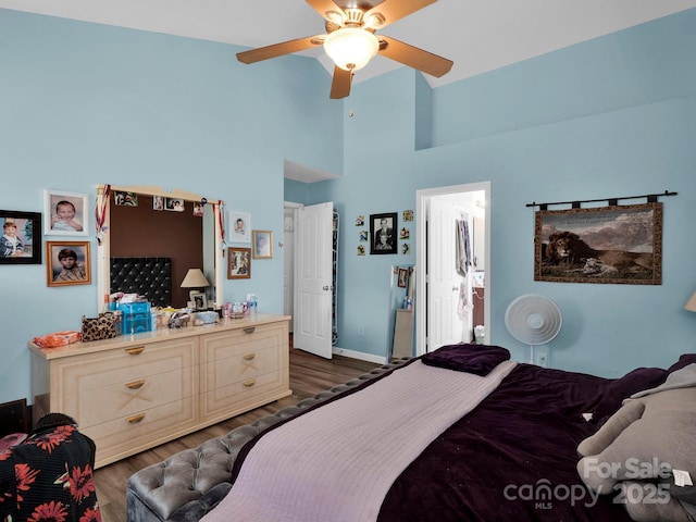 5102 Candleglow Ct, Indian Trail, NC 28079 - bedroom featuring high vaulted ceiling, ceiling fan, dark wood-style flooring, and ensuite bath