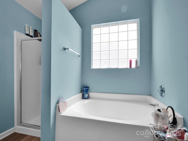 5102 Candleglow Ct, Indian Trail, NC 28079 - full bath featuring a shower stall, wood finished floors, and a bath