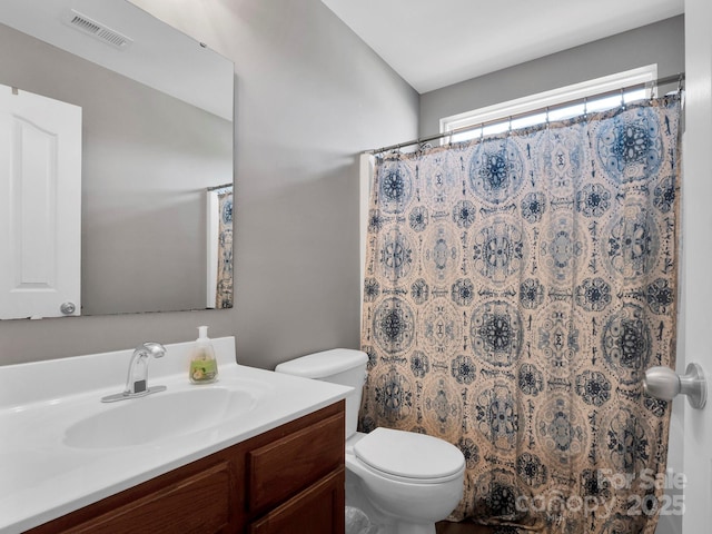 5102 Candleglow Ct, Indian Trail, NC 28079 - bathroom featuring toilet, visible vents, a shower with shower curtain, and vanity