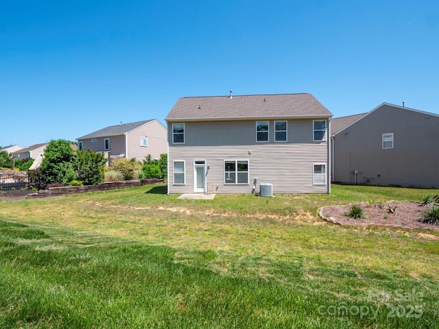 5102 Candleglow Ct, Indian Trail, NC 28079 - back of property featuring a lawn and central AC
