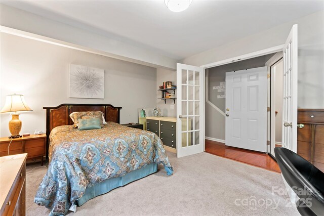 12905 Bullock Greenway Blvd, Charlotte, NC 28277 - carpeted bedroom featuring french doors