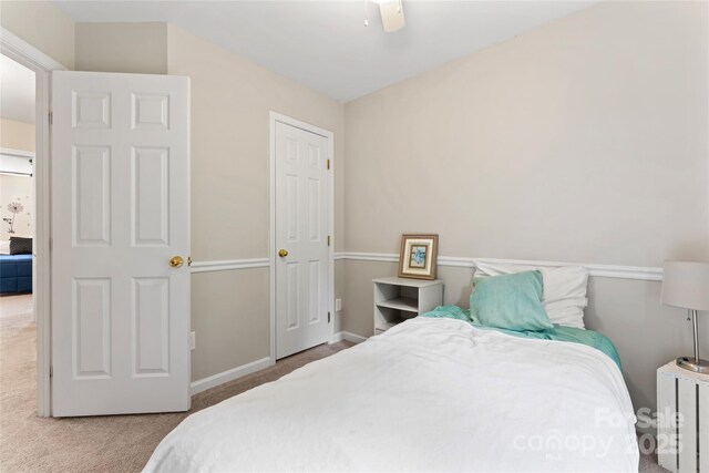 12905 Bullock Greenway Blvd, Charlotte, NC 28277 - carpeted bedroom with baseboards and a ceiling fan