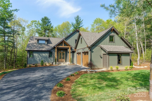 29 Wild Deer Trl, Zirconia, NC 28790 - view of front of home featuring asphalt driveway, roof with shingles, a front lawn, and french doors