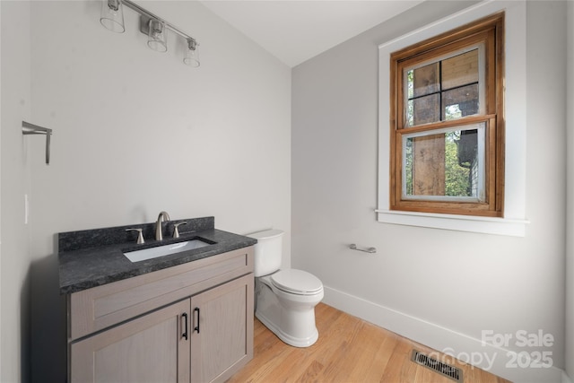 29 Wild Deer Trl, Zirconia, NC 28790 - half bathroom featuring wood finished floors and vanity