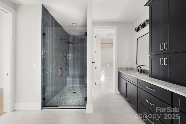 29 Wild Deer Trl, Zirconia, NC 28790 - bathroom with a shower stall, vanity, and tile patterned flooring