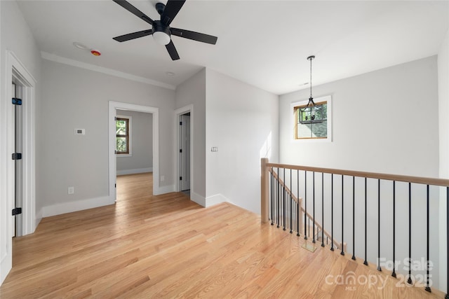 29 Wild Deer Trl, Zirconia, NC 28790 - unfurnished room with light wood-style floors and a ceiling fan
