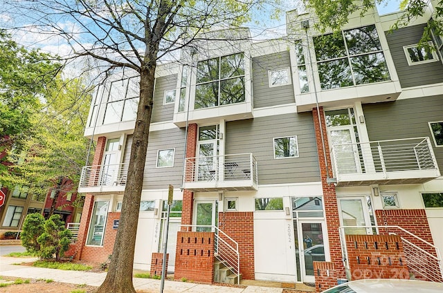 exterior space with brick siding