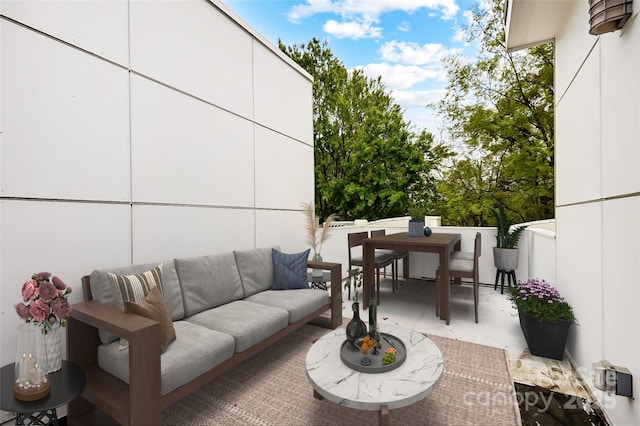 view of patio / terrace with outdoor dining area and an outdoor hangout area