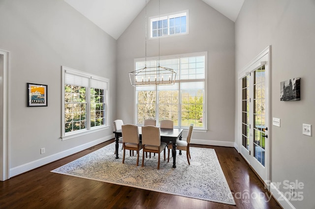 1404 Churchill Downs Dr, Waxhaw, NC 28173 - dining area featuring plenty of natural light, a notable chandelier, and high vaulted ceiling