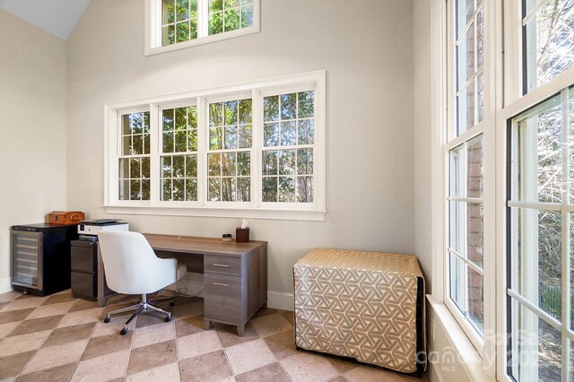 1404 Churchill Downs Dr, Waxhaw, NC 28173 - office area featuring high vaulted ceiling and baseboards