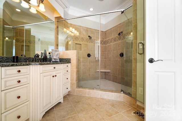 1404 Churchill Downs Dr, Waxhaw, NC 28173 - bathroom featuring tile patterned flooring, ornamental molding, a stall shower, and vanity