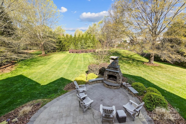 1404 Churchill Downs Dr, Waxhaw, NC 28173 - view of yard with a patio and an outdoor stone fireplace