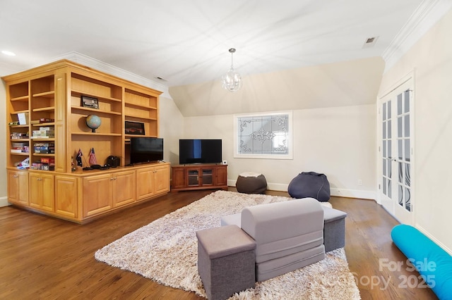 1404 Churchill Downs Dr, Waxhaw, NC 28173 - living area with crown molding, dark wood finished floors, baseboards, and a chandelier