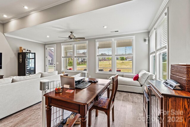 8718 Festival Way, Charlotte, NC 28215 - dining space featuring crown molding, visible vents, recessed lighting, and wood finished floors