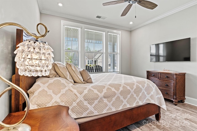 8718 Festival Way, Charlotte, NC 28215 - bedroom featuring recessed lighting, ornamental molding, and wood finished floors