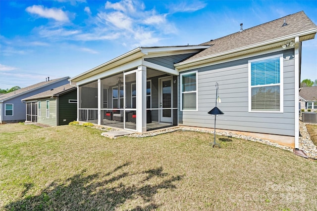 8718 Festival Way, Charlotte, NC 28215 - rear view of house with a sunroom, a yard, and a shingled roof