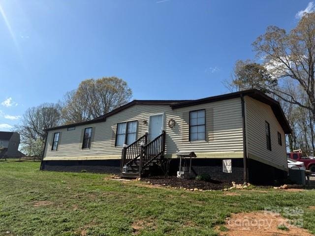 5061 Windy Woods Rd, Morganton, NC 28655 - manufactured / mobile home featuring a front yard