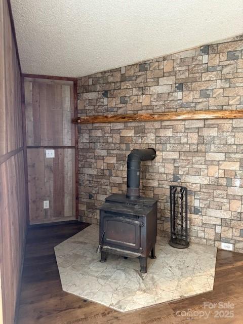 5061 Windy Woods Rd, Morganton, NC 28655 - interior details with a textured ceiling, wood finished floors, and wooden walls