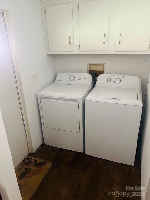 5061 Windy Woods Rd, Morganton, NC 28655 - laundry room with dark wood-style floors, washer and dryer, and cabinet space