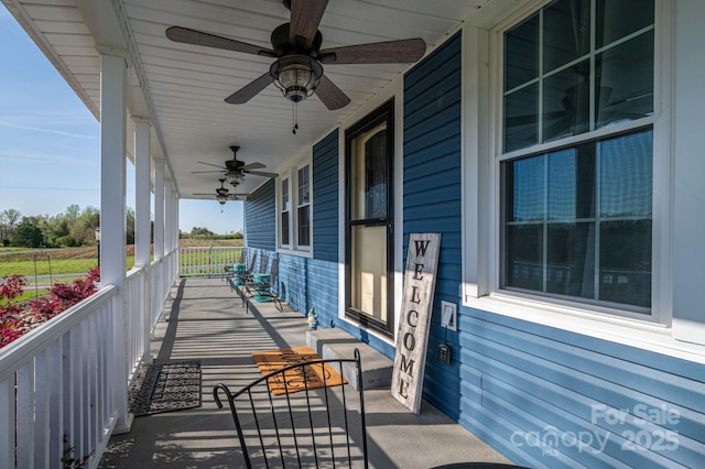 view of patio featuring a ceiling fan and covered porch