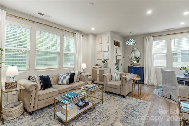 1354 Galloway Rd, Charlotte, NC 28262 - living room featuring wood finished floors, visible vents, and recessed lighting