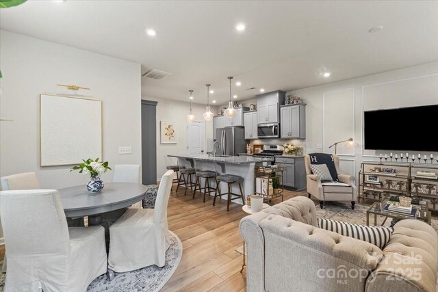 1354 Galloway Rd, Charlotte, NC 28262 - living area featuring light wood-style floors, visible vents, and recessed lighting