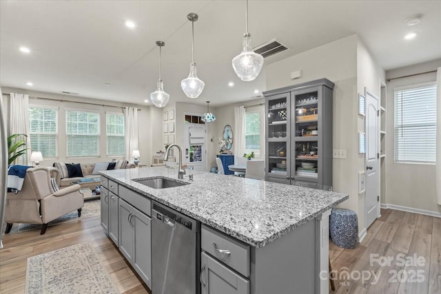 1354 Galloway Rd, Charlotte, NC 28262 - kitchen featuring gray cabinetry, dishwasher, visible vents, and a sink
