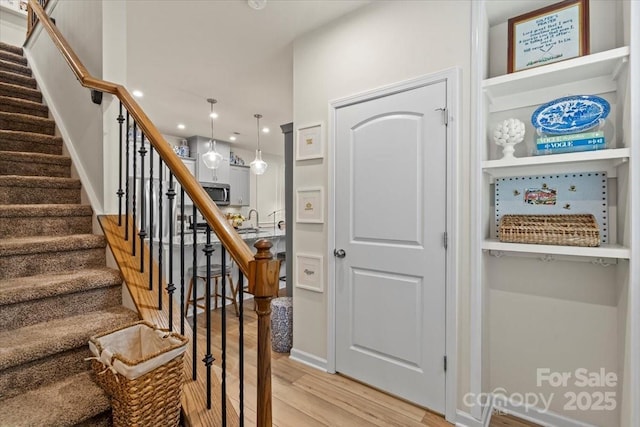 1354 Galloway Rd, Charlotte, NC 28262 - staircase with wood finished floors