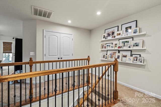 1354 Galloway Rd, Charlotte, NC 28262 - hallway featuring visible vents, baseboards, an upstairs landing, carpet, and recessed lighting