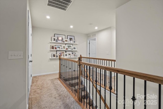 1354 Galloway Rd, Charlotte, NC 28262 - corridor with visible vents, baseboards, an upstairs landing, recessed lighting, and carpet flooring