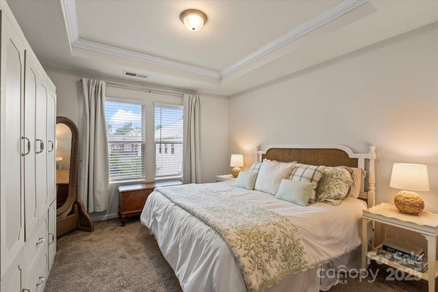 1354 Galloway Rd, Charlotte, NC 28262 - carpeted bedroom featuring a tray ceiling, ornamental molding, and visible vents