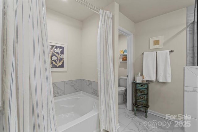1354 Galloway Rd, Charlotte, NC 28262 - bathroom featuring toilet, a garden tub, and marble finish floor