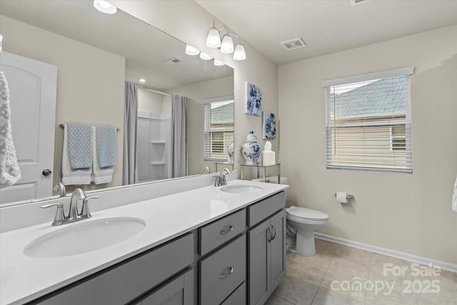 1354 Galloway Rd, Charlotte, NC 28262 - full bath with a wealth of natural light, visible vents, baseboards, and a sink