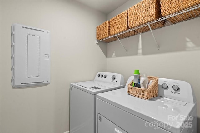 1354 Galloway Rd, Charlotte, NC 28262 - washroom featuring washer and dryer, laundry area, and baseboards