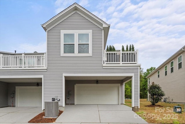 1354 Galloway Rd, Charlotte, NC 28262 - raised beach house with central AC unit, a garage, and concrete driveway
