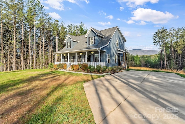 1294 Saylor Way, Nebo, NC 28761 - view of front facade with a porch and a front lawn