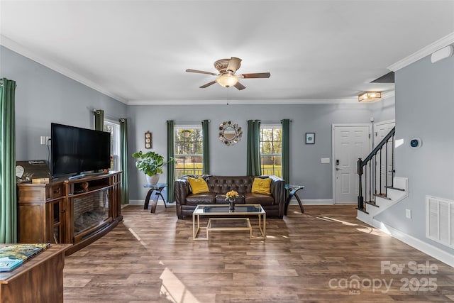 1294 Saylor Way, Nebo, NC 28761 - living room featuring visible vents, ornamental molding, a ceiling fan, wood finished floors, and stairs