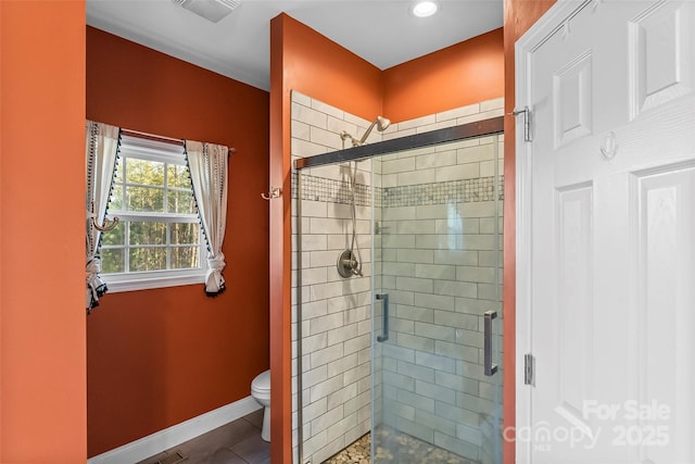 1294 Saylor Way, Nebo, NC 28761 - bathroom with visible vents, toilet, a stall shower, and baseboards