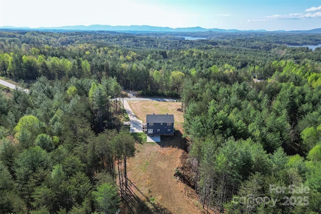 1294 Saylor Way, Nebo, NC 28761 - aerial view featuring a view of trees and a mountain view