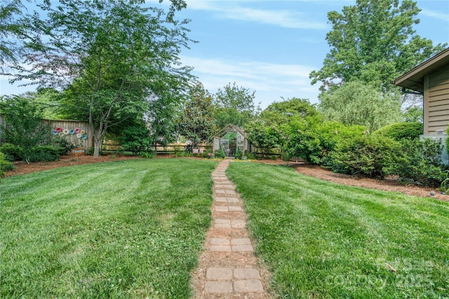 10315 Washam Potts Rd, Cornelius, NC 28031 - view of yard featuring a greenhouse and an outbuilding
